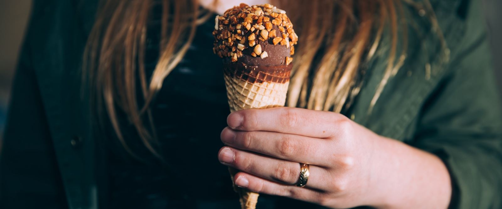 Photo of a girl holding an ice cream